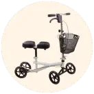 Image of a knee scooter against a cream background.