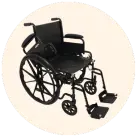 Image of a manual wheelchair against a cream circular background